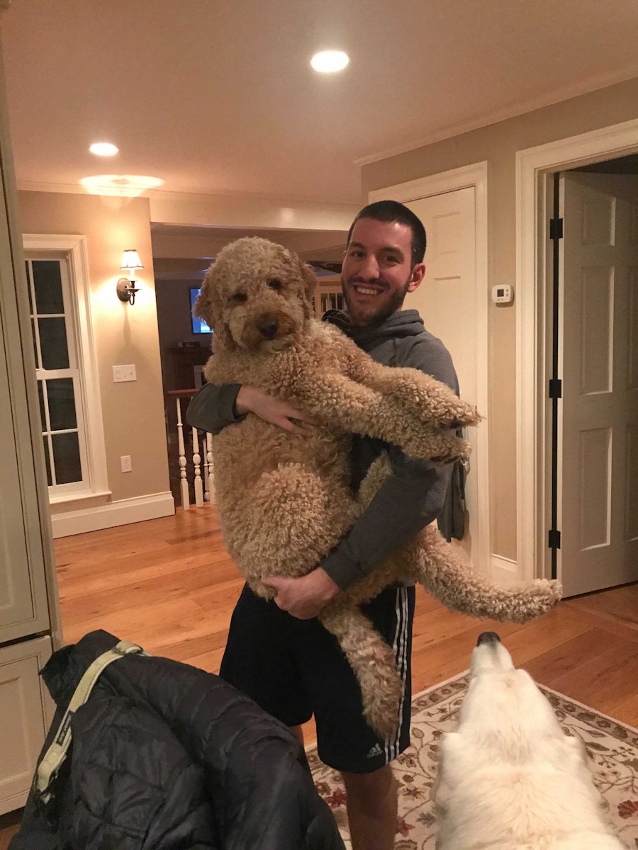 Mike holding his giant dog